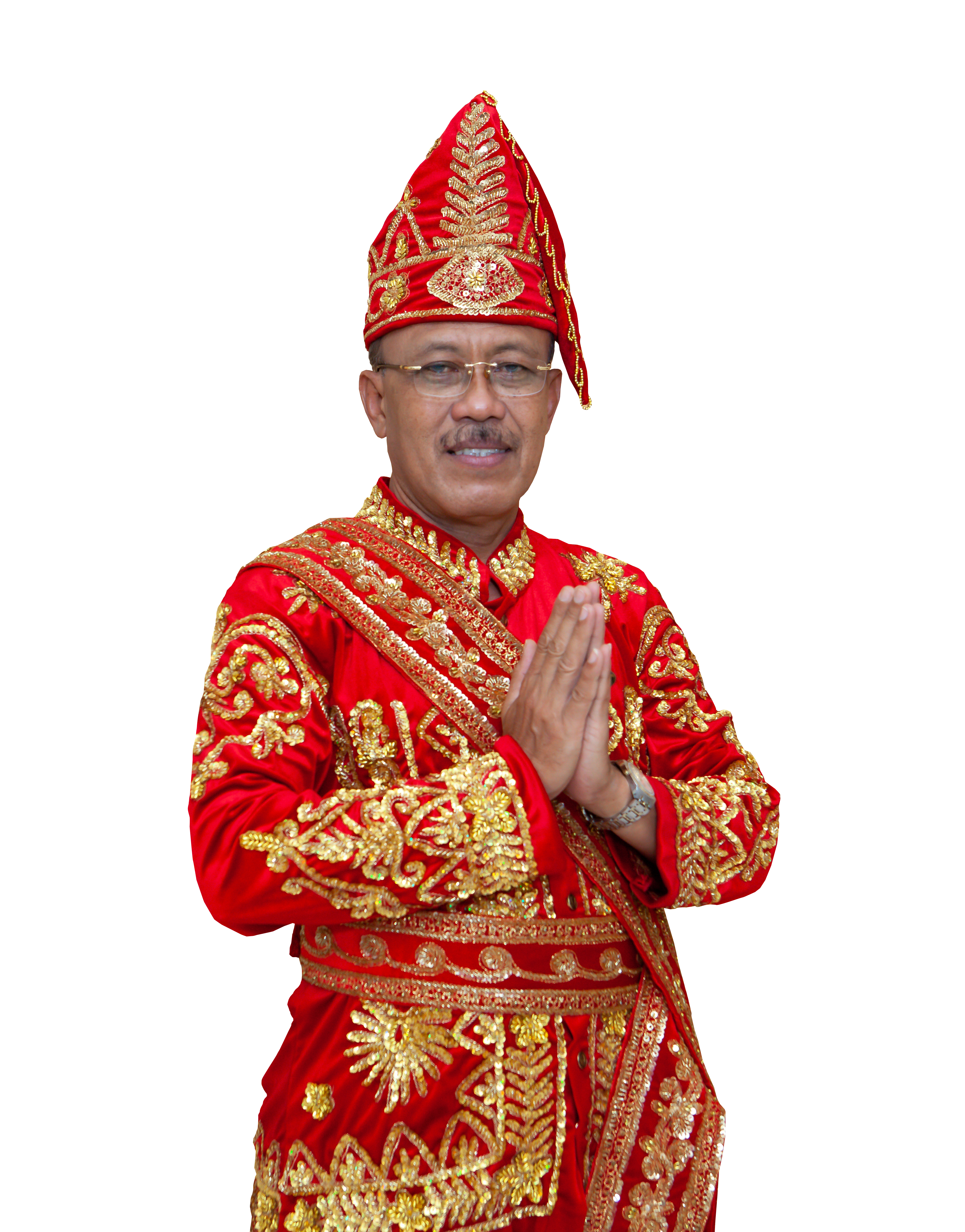 Potret Wakil Bupati Morowali tersenyum ramah dengan latar kantor, memakai kemeja batik resmi